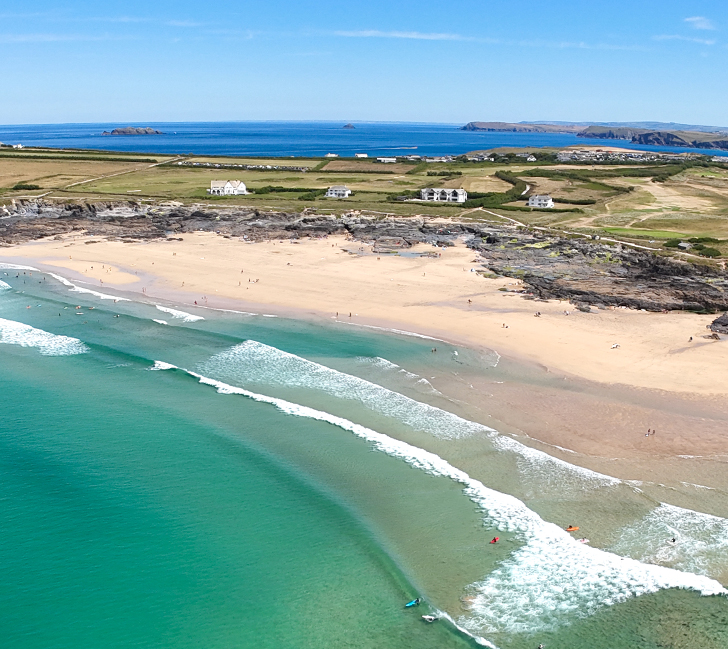 View across Booby's Bay at low tide revealing expansive golden sands