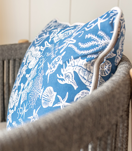 Elegant fabrics and natural textures creating a relaxing sauna space.