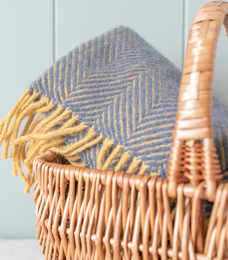 The Peregrine hallway styled with contemporary coastal colours and thoughtfully chosen textured accessories.