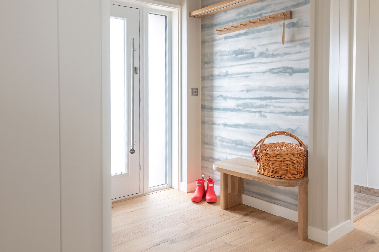 Light-filled hallway in The Sandpiper lodge featuring refined interior finishes.