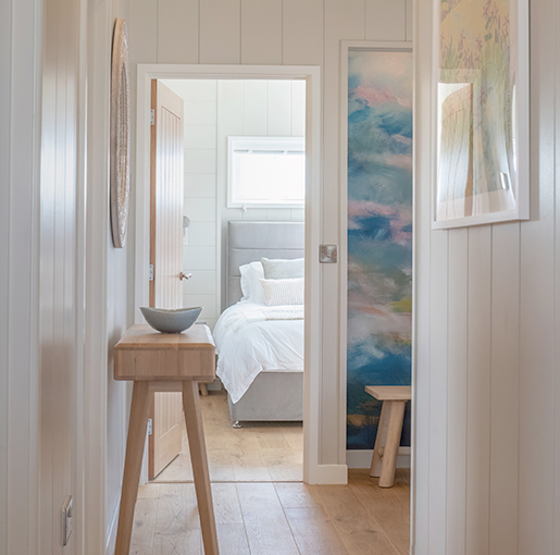 Elegant hallway view through to the spacious master bedroom