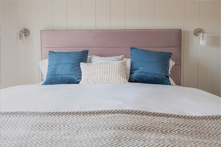 Beautifully appointed second bedroom in The Shearwater luxury lodge.